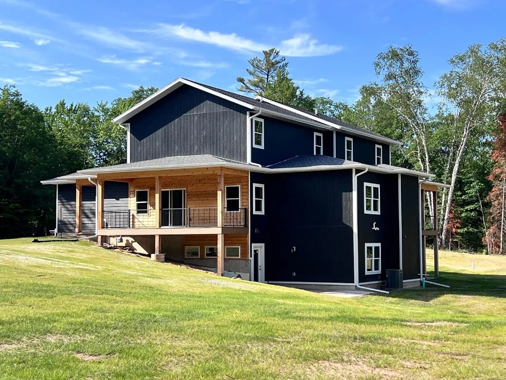 Co-Own a Northwoods Lake Retreat in Eagle River, WI — 6 Shares Available, Plum Managed - Image 1